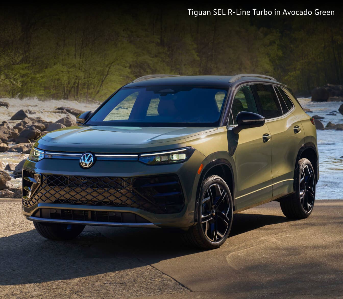 2026 Volkswagen Tiguan SEL R-Line Turbo in Avocado Green parked by the water