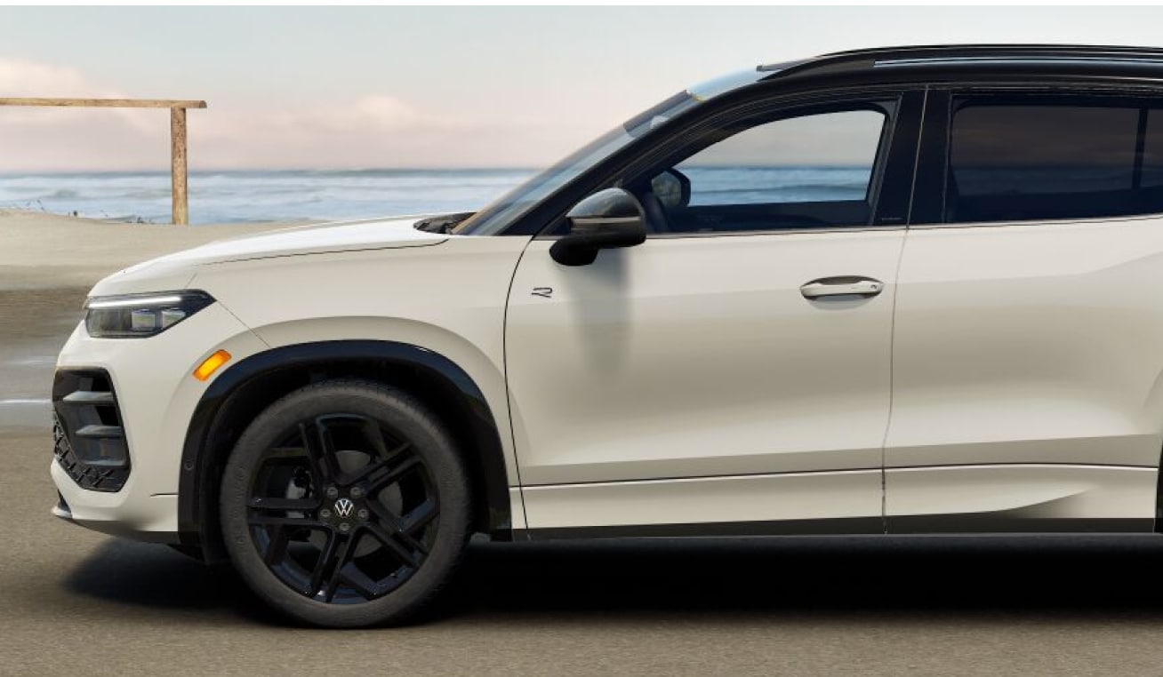 Front exterior side view of a 2026 Volkswagen Tiguan in white