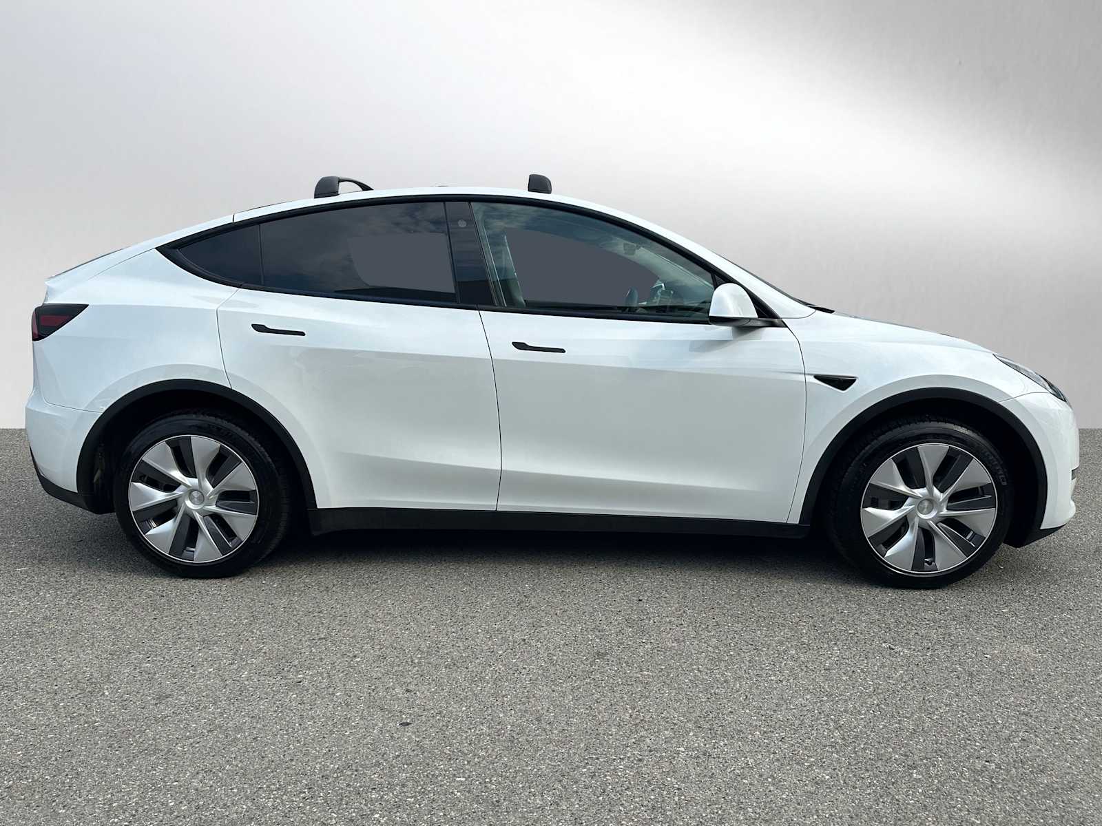 Used 2023 Tesla Model Y Long Range with VIN 7SAYGDEE8PA101860 for sale in Bellevue, WA