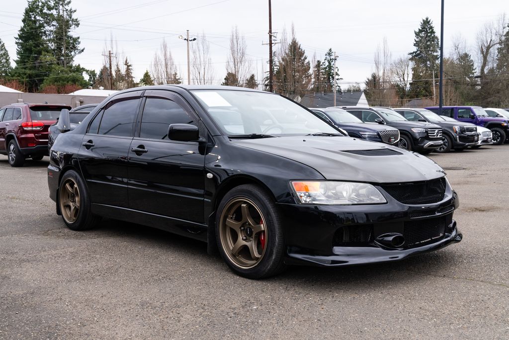 Labrador Black Pearl 2006 Mitsubishi Lancer Evolution Sedan All-Wheel Drive Automatic