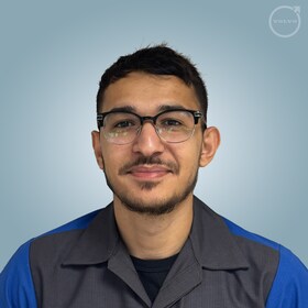 Staff member Sadik Mohamad from bc8809cbb17e