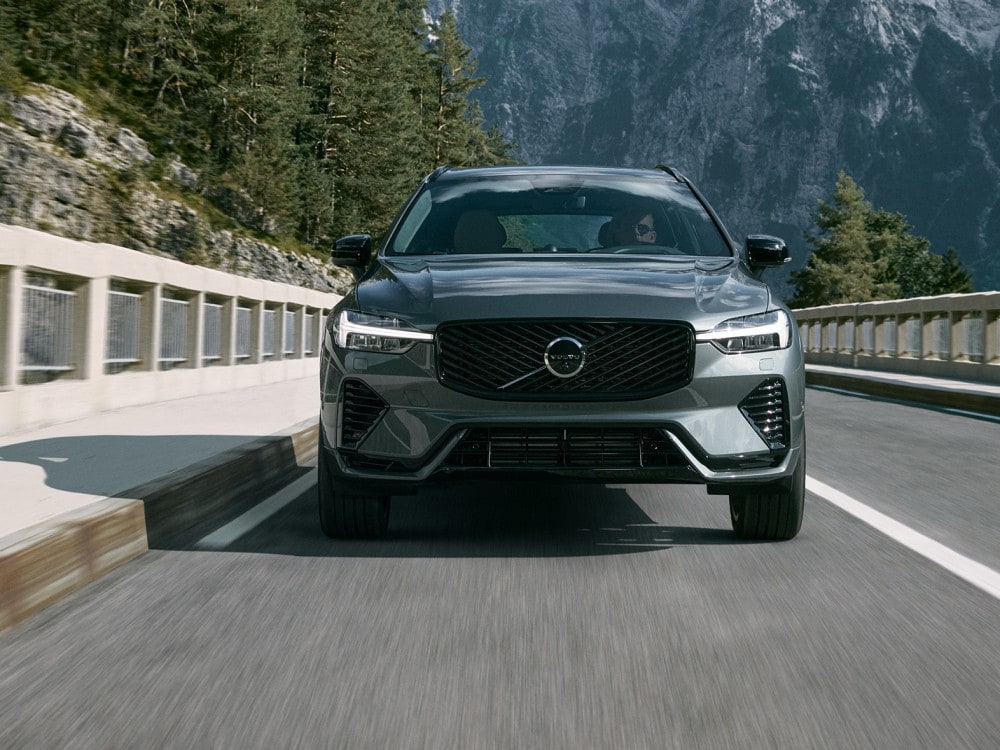  Person cheerfully signing documents.