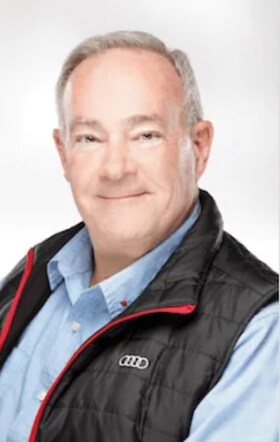 Staff member Roger Labas from ID_8d6b1f3c24ce