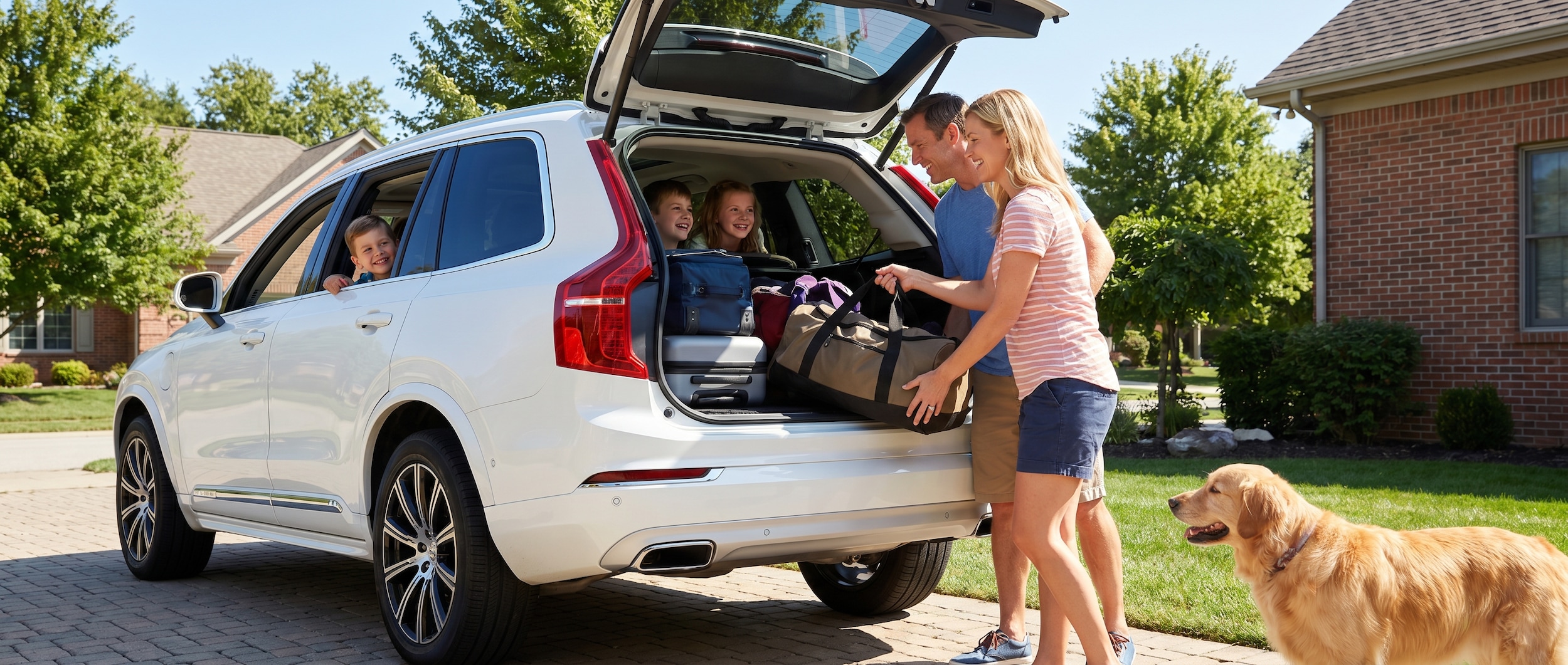 Family playing road trip games in a Volvo XC90 near Greenville, SC