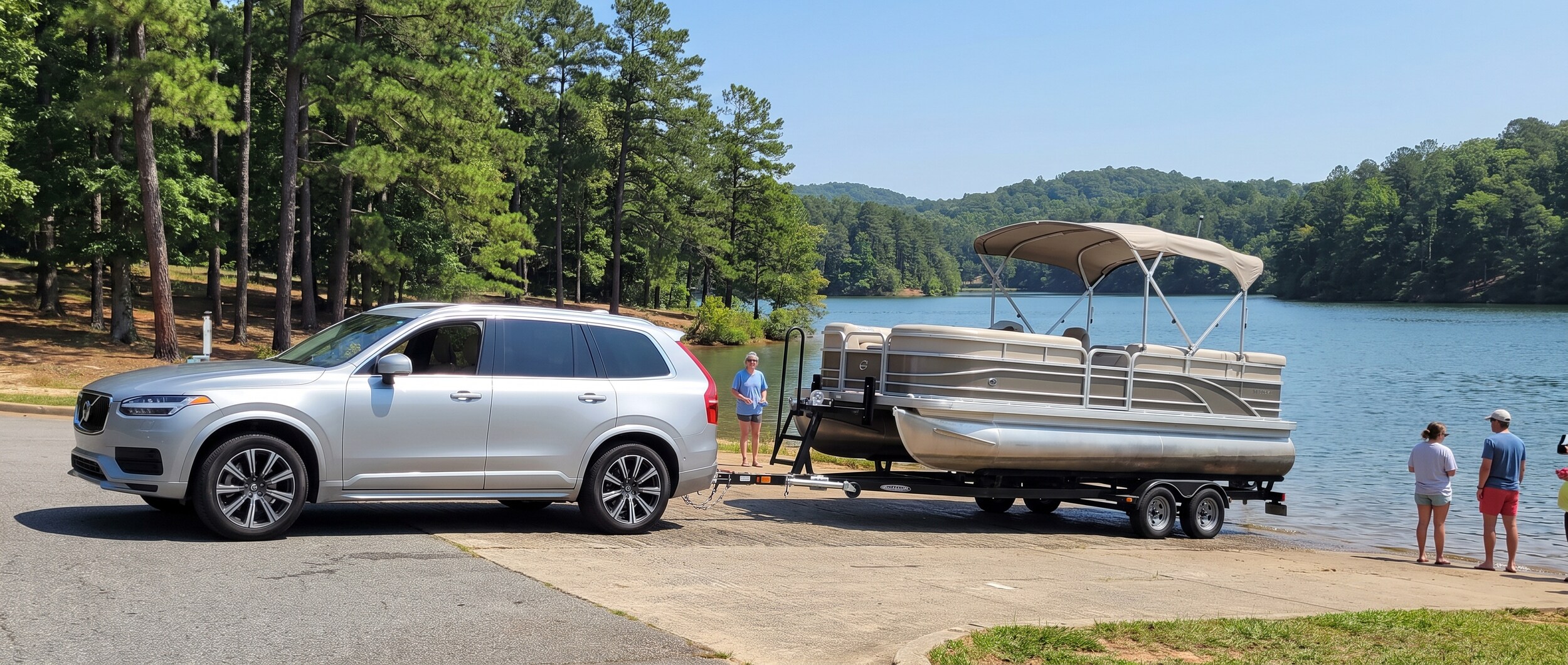 2026 Volvo XC90 towing a pontoon boat at a South Carolina lake boat ramp
