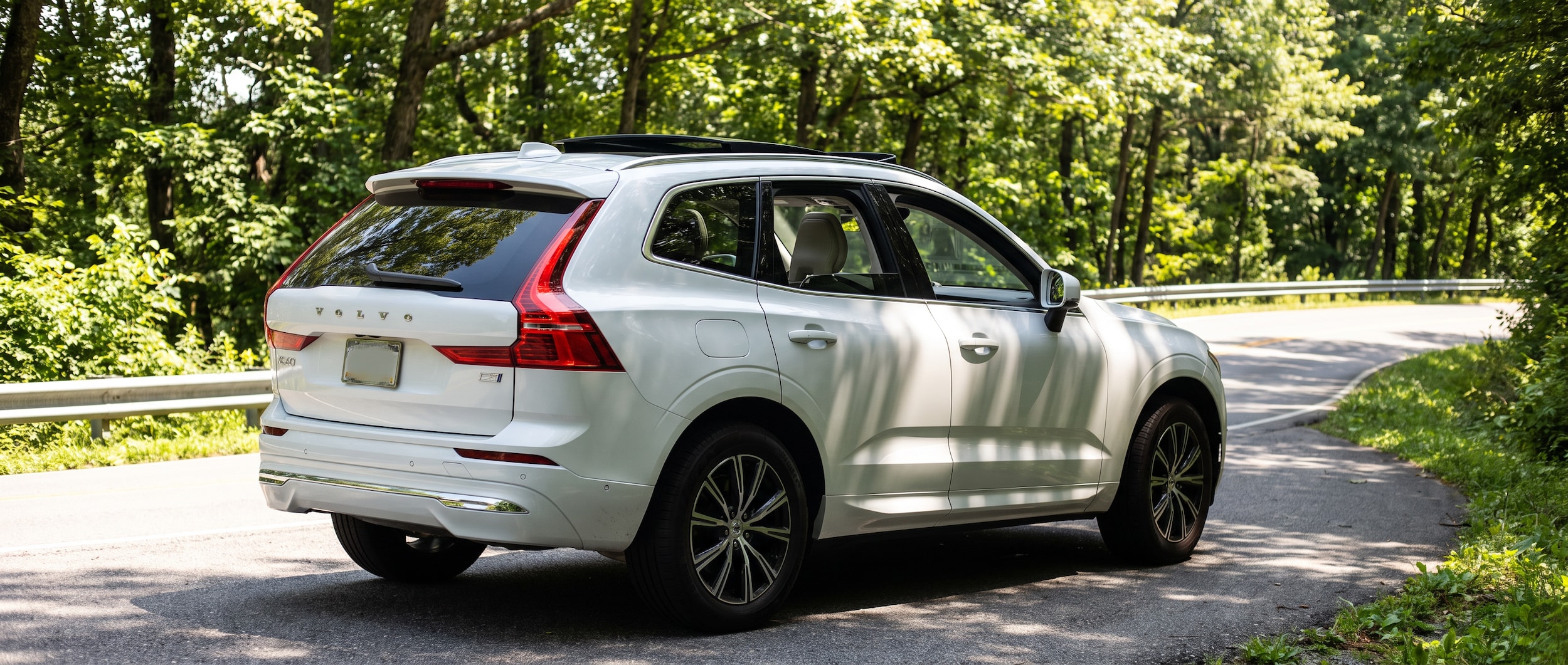 2026 Volvo XC60 panoramic sunroof open on a scenic summer drive in Upstate South Carolina