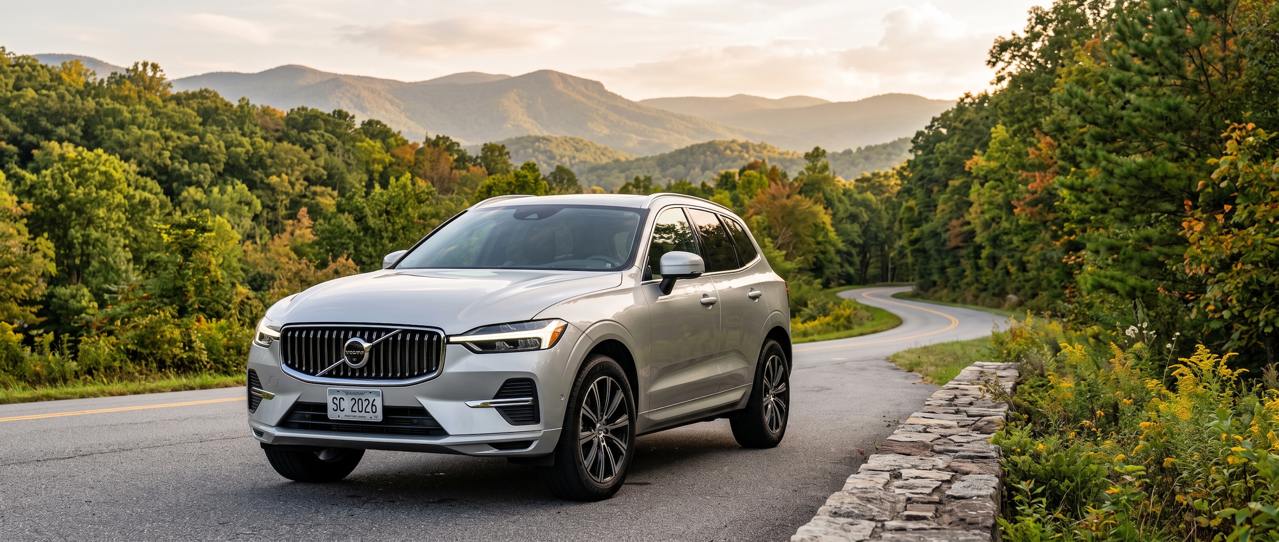 2026 Volvo XC60 on a Blue Ridge foothills road near Greenville SC in late summer