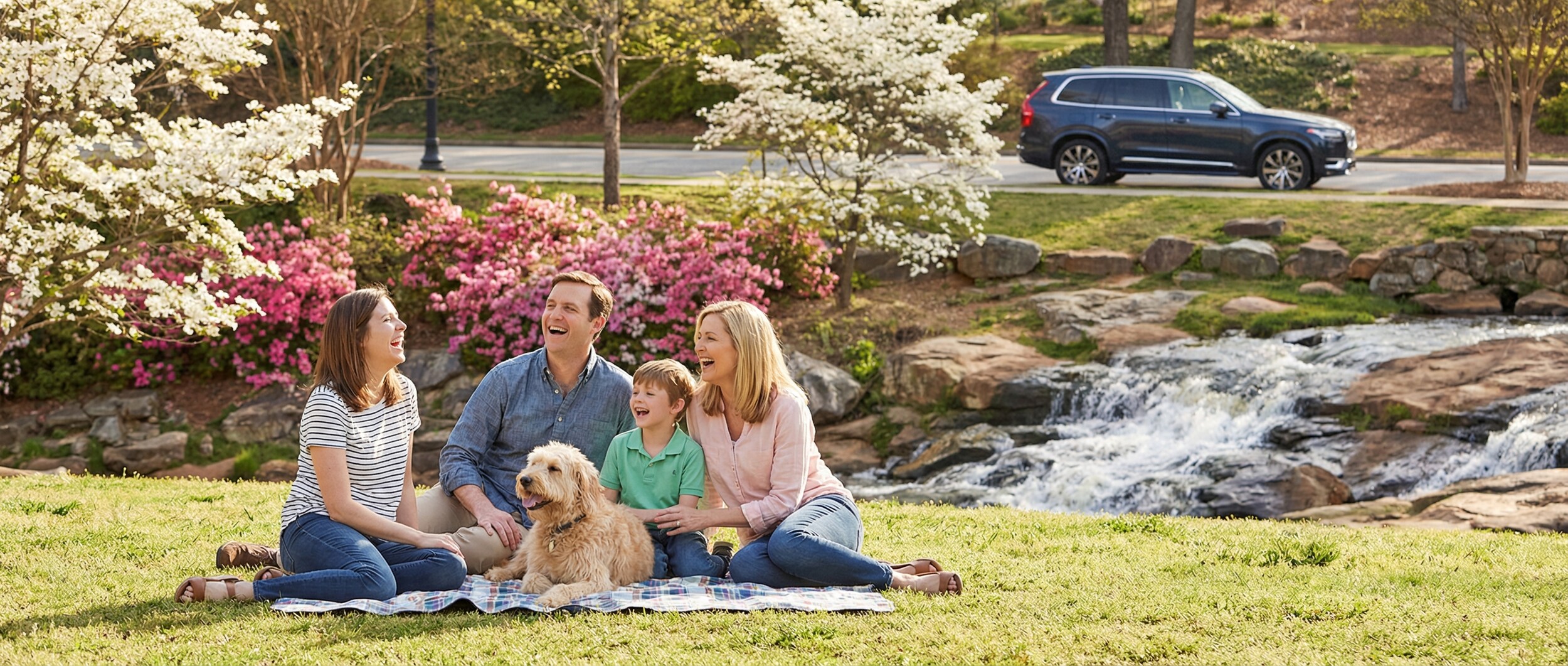 Families enjoying spring activities at Falls Park in Greenville, SC