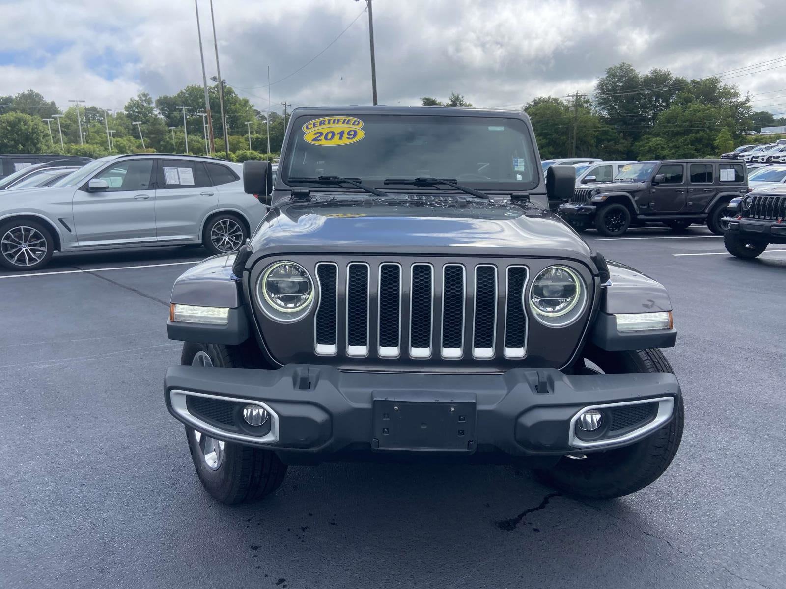 Used 2019 Jeep Wrangler Unlimited Sahara with VIN 1C4HJXEG6KW549104 for sale in Greenville, SC