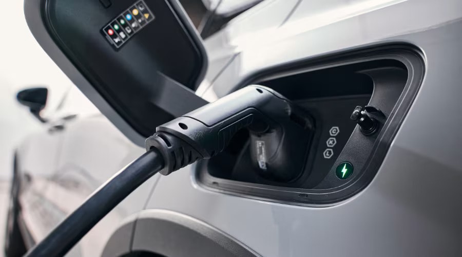 Volvo EX30 EV being charged.