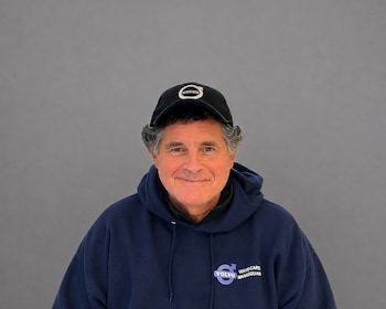 Staff member Damon Massio from 91cbab41963f