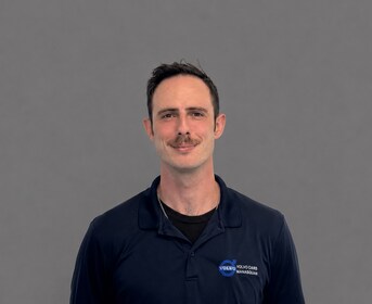 Staff member Sean Burke from 91cbab41963f