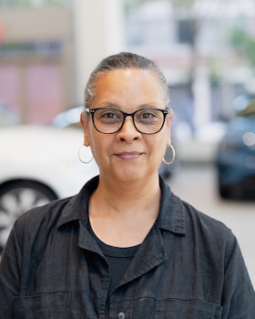 Staff member Anna Rosario from ca8e484a3609