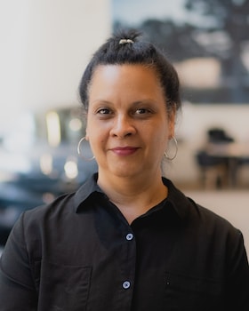 Staff member Anna Rosario from ca8e484a3609