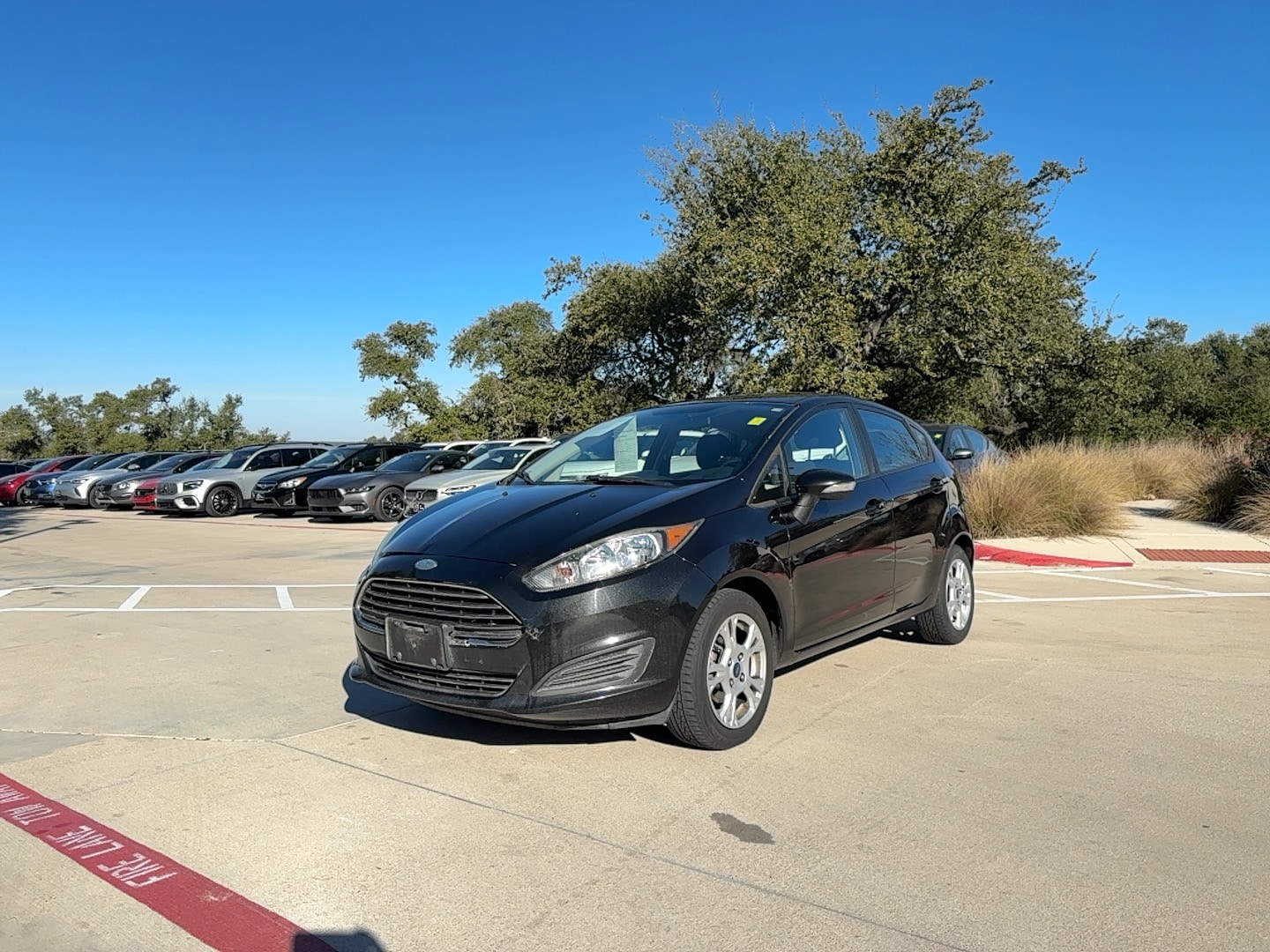 Used 2014 Ford Fiesta SE with VIN 3FADP4EJ9EM211889 for sale in Austin, TX
