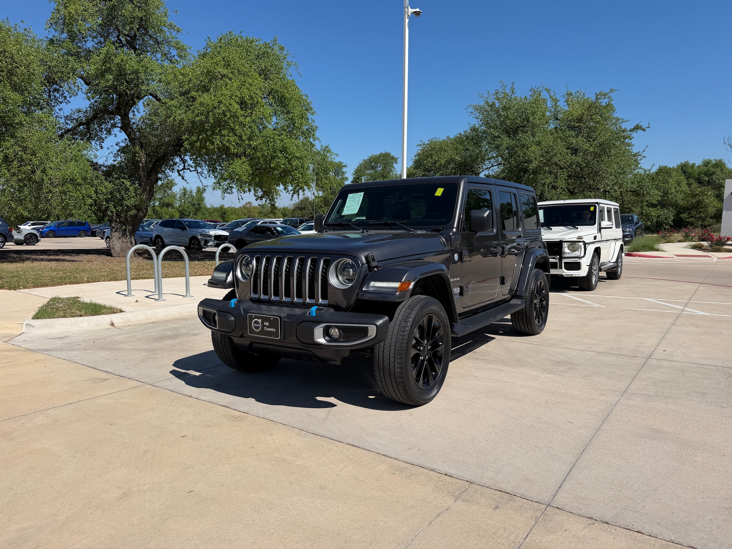 Used 2023 Jeep Wrangler 4xe Sahara 4XE with VIN 1C4JJXP6XPW514613 for sale in Austin, TX