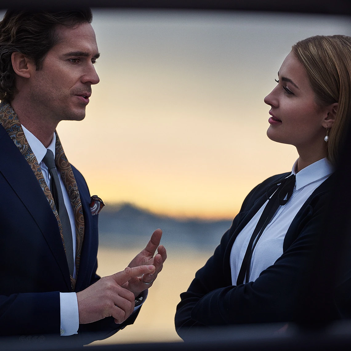 Female Volvo Concierge Expert talking to male customer