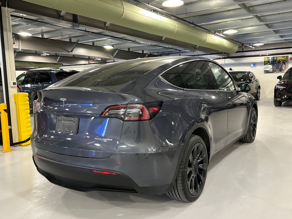 Used 2023 Tesla Model Y Long Range with VIN 7SAYGDEE7PF618067 for sale in Elmsford, NY