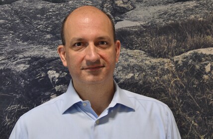 Staff member John DeAngelis from ID_558517