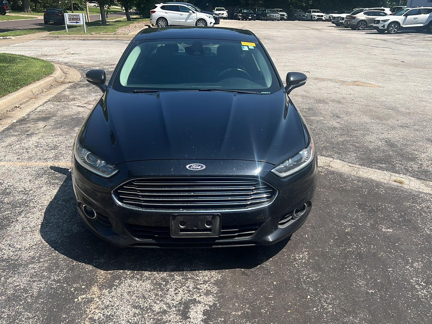 Used 2016 Ford Fusion Hybrid SE with VIN 3FA6P0LU0GR142157 for sale in Kansas City