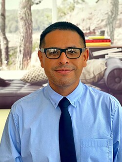 Staff member John Aguilar from ID_ea608ee3b725