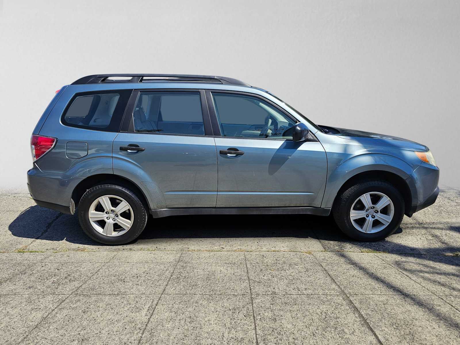 Used 2010 Subaru Forester X with VIN JF2SH6BC5AG905243 for sale in Seattle, WA