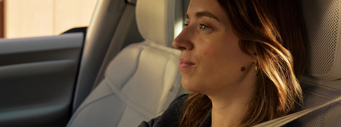 Woman driving in the 2026 Volvo EX60