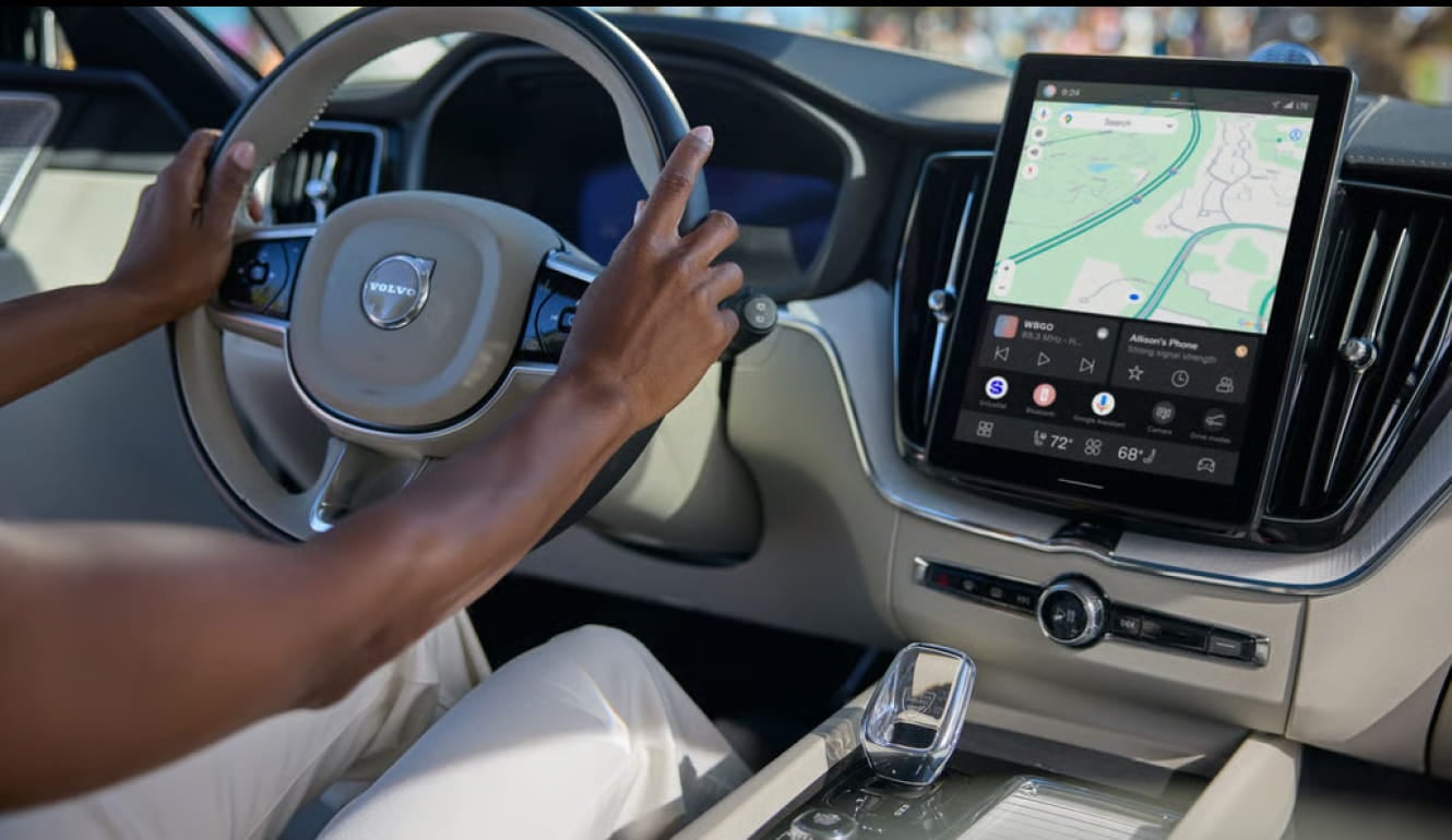 Driver’s view of the Volvo XC60 interior with the touchscreen displaying navigation.