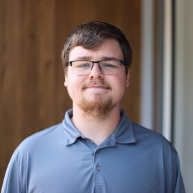 Staff member Santi Burns from ID_1acf007f6113