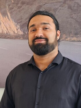 Staff member Travis Evora from 42c57a262fdd