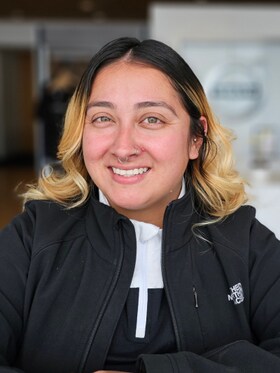 Staff member Xiomara Fuentes from 518ac10189ee