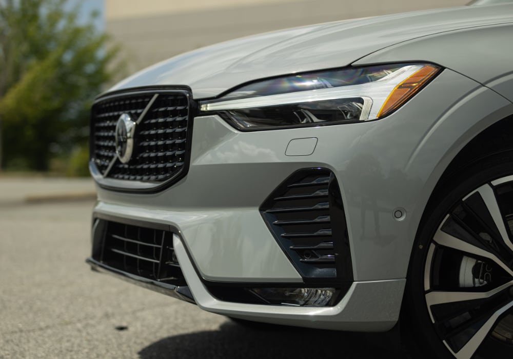Close up of the front of a gray Volvo SUV