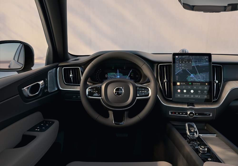 Volvo XC60 PHEV interior including the steering wheel and infotainment system