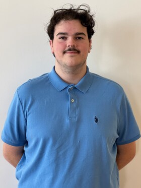 Staff member Tyler Goss from 1937c0a16592