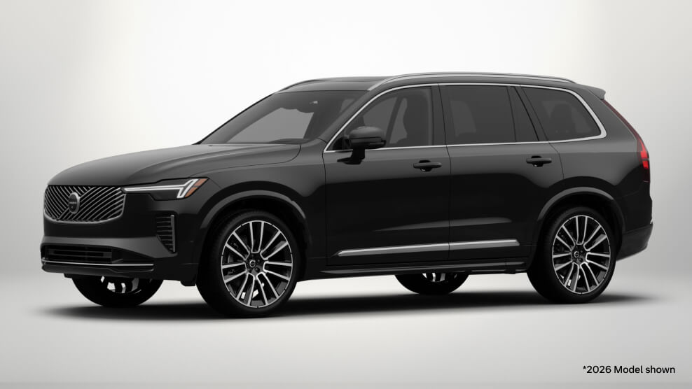 2026 Volvo XC90 Ultra in Onyx Black, front three-quarter view with a light gray studio background.