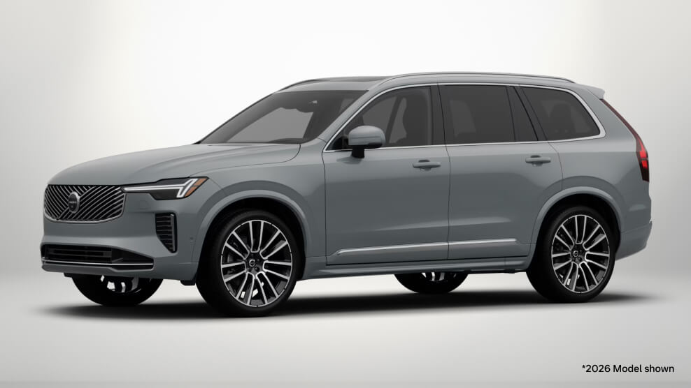 2026 Volvo XC90 Ultra in Vapour Grey, front three-quarter view with a light gray studio background.