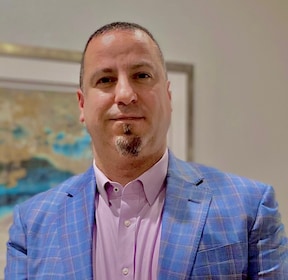 Staff member Sam Hilou from ID_0c726bfb301c