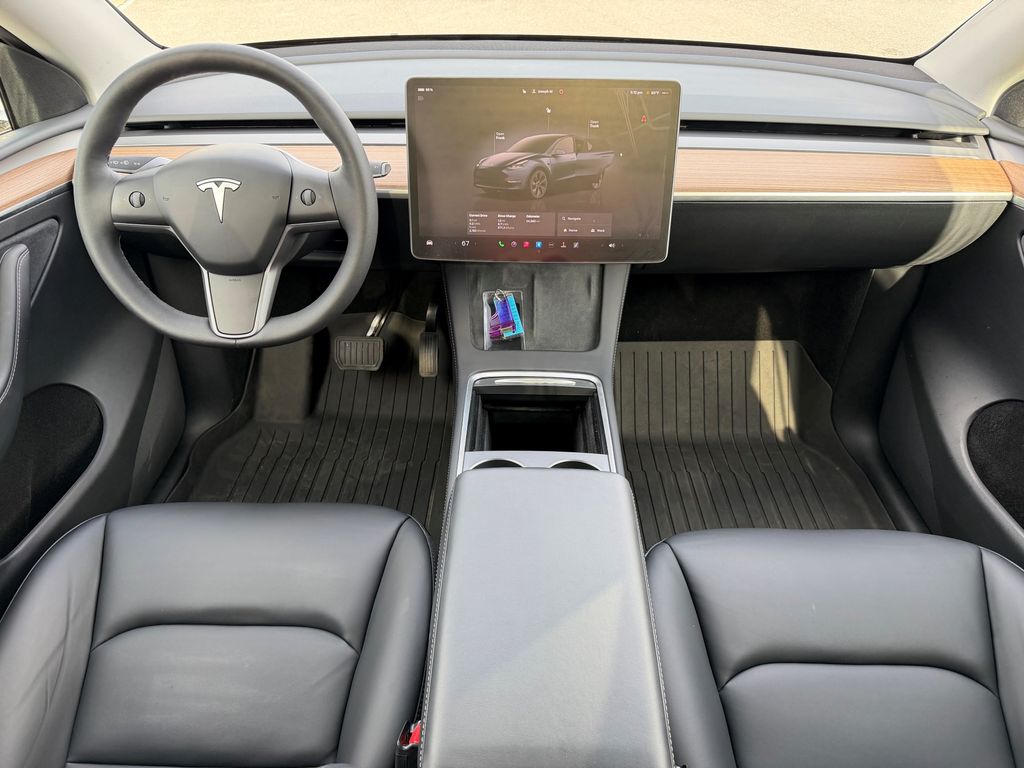 Used 2025 Tesla Model Y Long Range with VIN 7SAYGDEE9SF301223 for sale in Frederick, MD