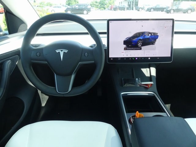 Used 2023 Tesla Model Y Long Range with VIN 7SAYGDEE1PF682721 for sale in Kansas City