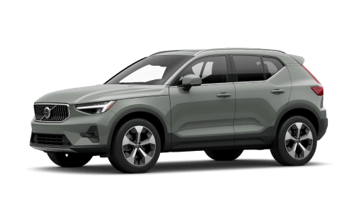 Front three-quarter studio view of a green Volvo XC40 SUV on a plain white background.