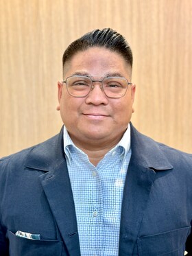 Staff member Manny Dela Cruz from ID_9e1dc7