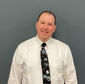 Staff member Mark Molloy from d6cad41411cc