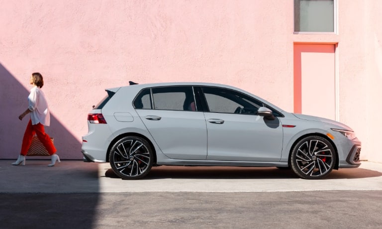 2024 VW Golf GTI exterior parked with driver walking away