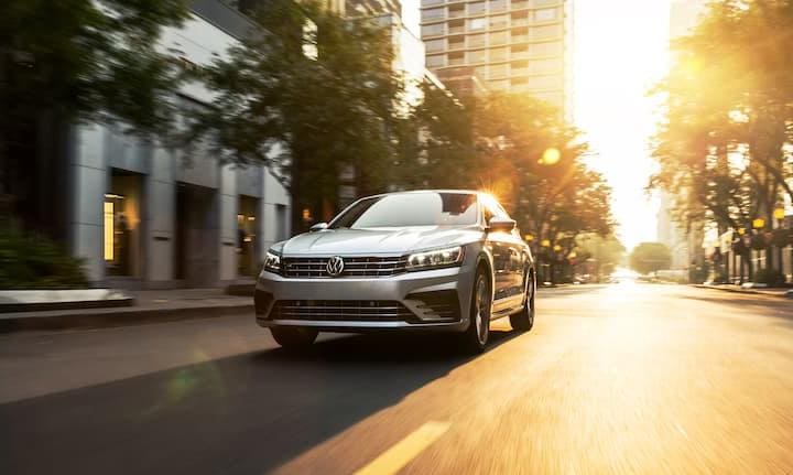 2019 Silver VW Passat Driving at Sunset