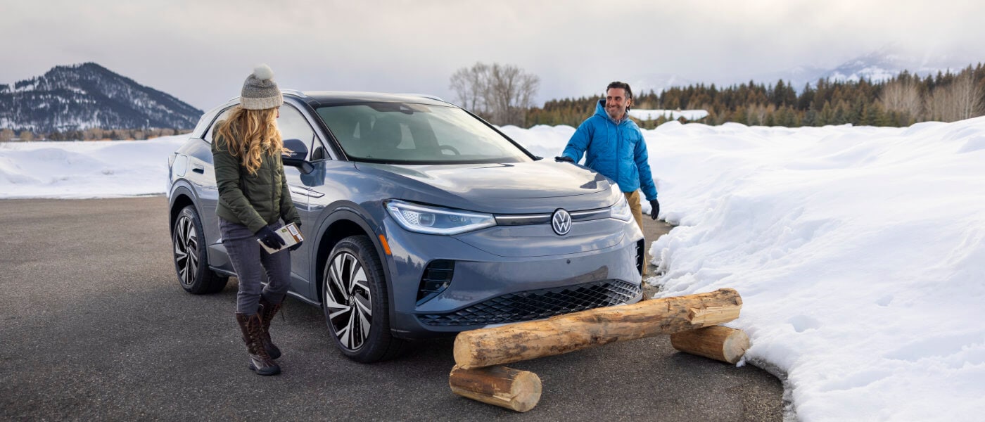 2024 Volkswagen ID.4 exterior parked by snowbank