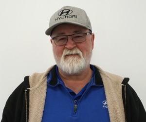Staff member John Blake from ID_e89f3e3307cc