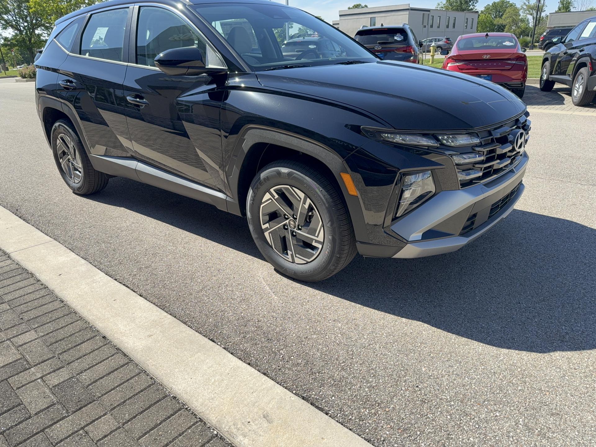 2026 Hyundai Tucson Hybrid Blue, photo 3 of 12
