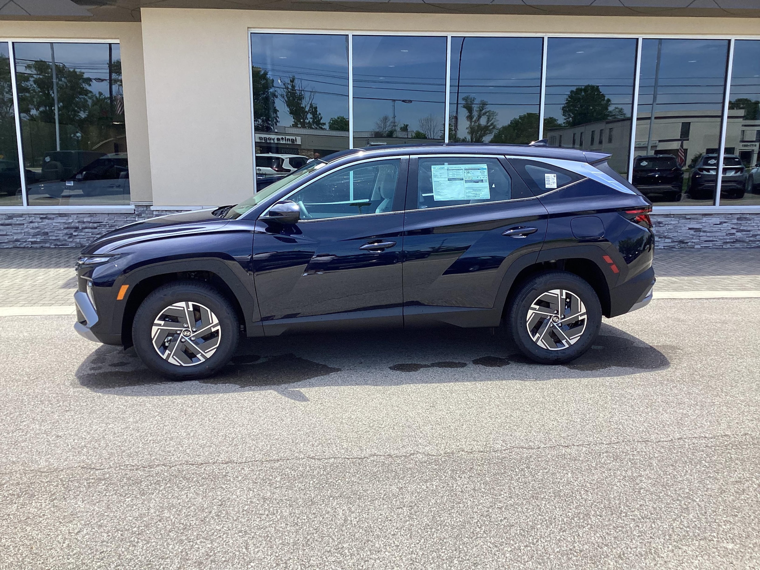 2026 Hyundai Tucson Hybrid Blue, photo 1 of 12