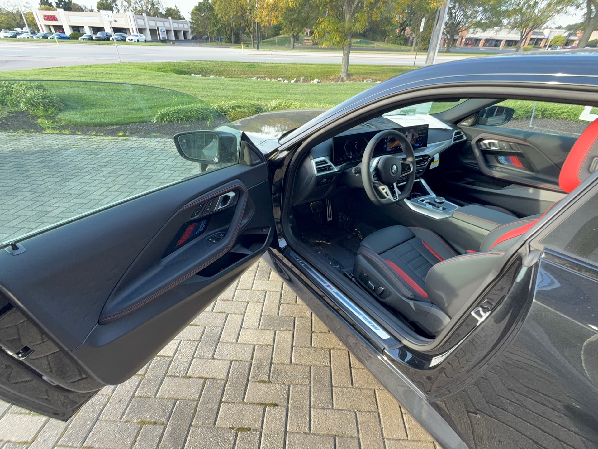 2026 BMW 230i xDrive, photo 7 of 12