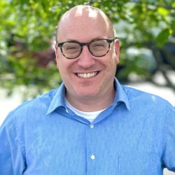 Staff member Eric Lane  from ID_059493